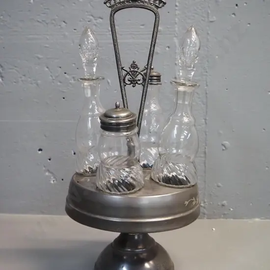vintage glass condiment set on silver plated stand - 2 sauce bottles, shaker and salt or mustard pot H390 D170