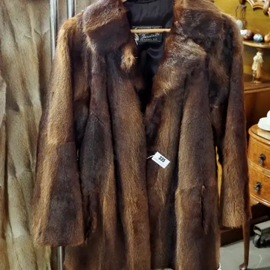 brown fur jacket with Mutual Furs Dunedin label