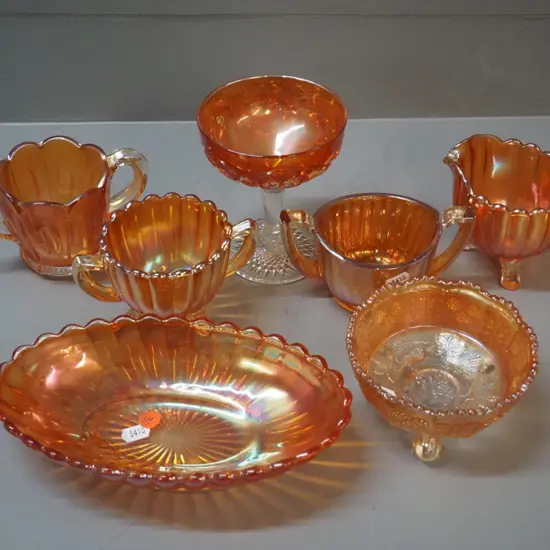 7 pieces of marigold carnival glass - 4 small bowls, stemmed comport, jug, oval dish