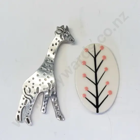 silver giraffe brooch stamped 'Mexico 925' & contempry pottery brooch