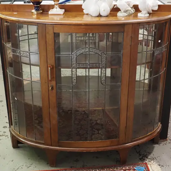 mahogany deco china cabinet w/ half-round leadlight front , 1 door, 2 timber shelves, mirrored back, bakelite handle