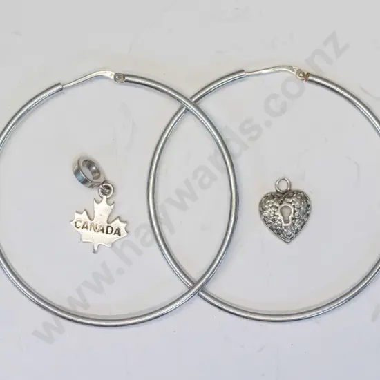 pair of silver hoop earrings, silver heart necklace [no chain] & silver maple leaf no chain] all stamped 925