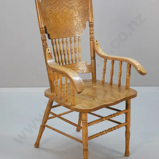 reproduction oak spindle and pressed-back elbow chair H-1070 W-570 D-500