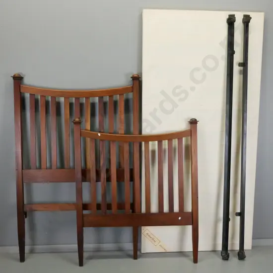 dark stained single bed ends with metal rails and base. Taller is H-1430 W-960