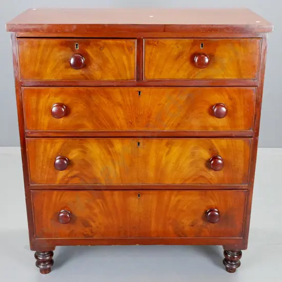 antique mahogany 5-drawer chest with flame mahogany fronts - repaired split to top