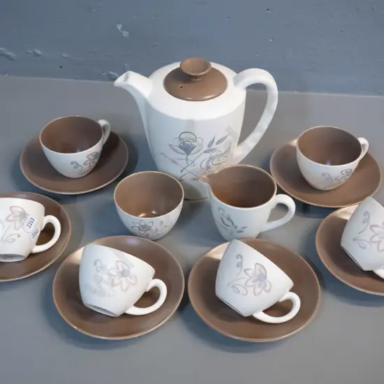 Poole 15-piece coffee set in 2-tone with floral pattern. Some cellotape residue, fleck to one cup.Coffee pot H-155 W-170