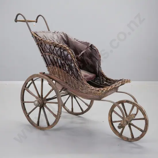 Victorian 3-wheeled pram - timber, woven cane and leatherette, timber wheels with metal strapping - overall wear & tear