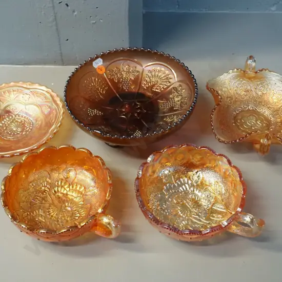 5 pieces of marigold colour carnival glass - bowls and dishes - largest is footed peacock bowl H-80 D-190