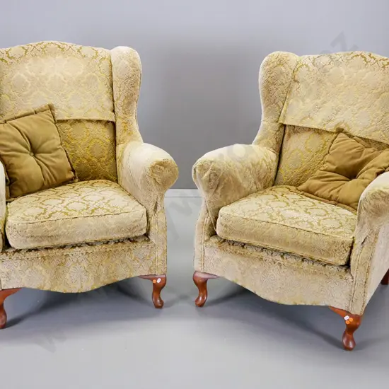 pair of chesterfield style wing chairs covered in gold embossed velvet, 2 scatter cushions. H960 W780 D750