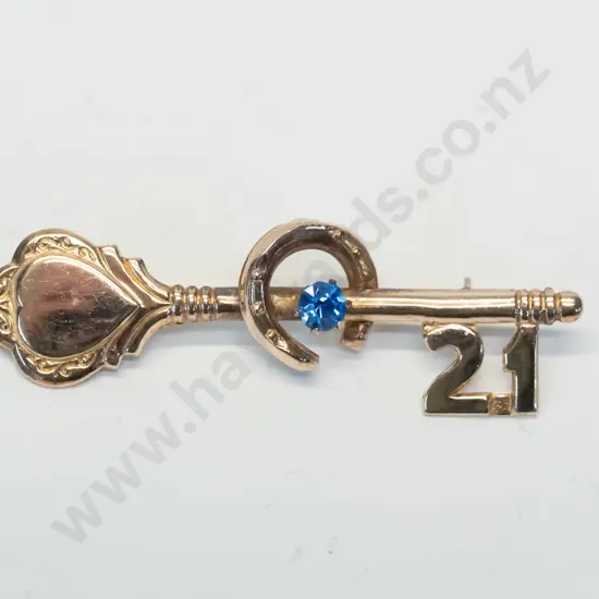 9ct plated 21st key brooch - stamped