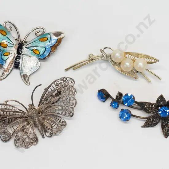 4 costume brooches