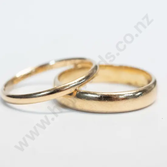 2 18ct gold wedding rings both stamped