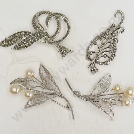 4 costume brooches