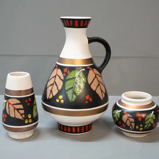 3 German pottery vases in same leaf pattern - one is handled H-215 D-130