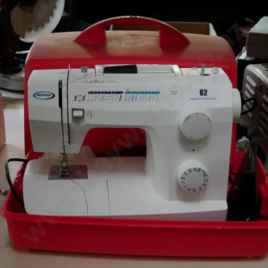 Semco sewing machine in plastic carry case
