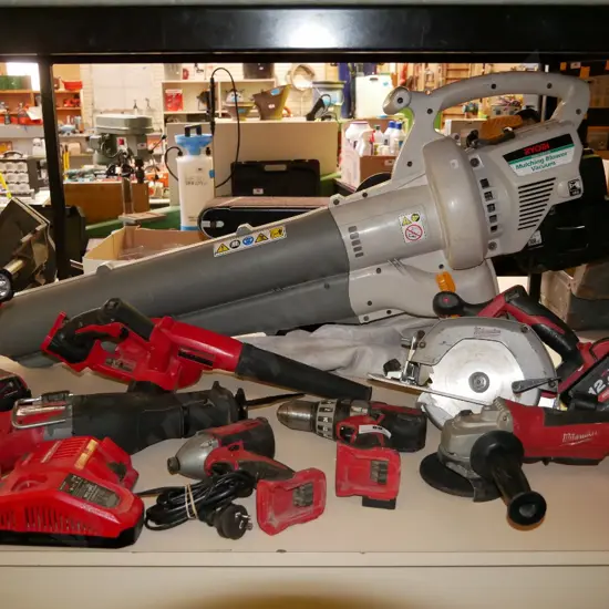 Milwaukee battery powered tool set; torch, blower, skilsaw, impact driver, drill, grinder