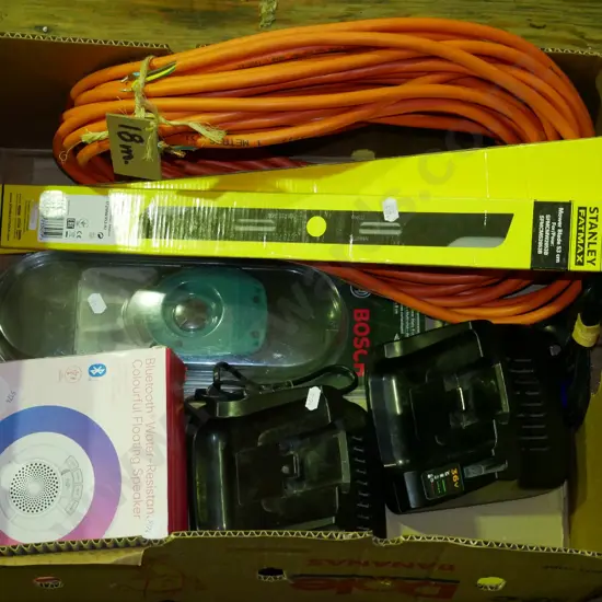 box; extension cords, mower blades, blue tooth floating speaker etc