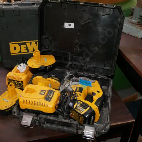 cased De Walt battery jig saw with 2 chargers and 4 batteries