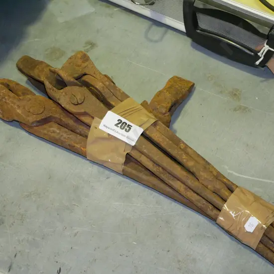 bundle of rusty blacksmith's tools