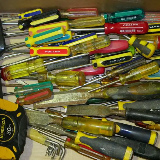 box; chisels, screwdrivers, 30m tape measure etc