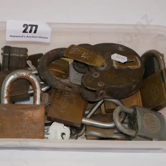 tub of various padlocks and keys