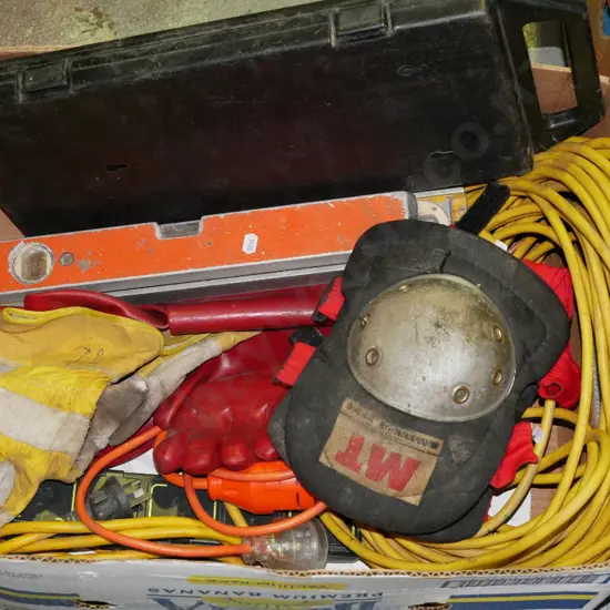 box; extension cords, knee pads, builder's levels