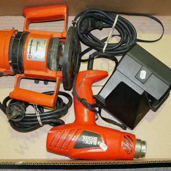 box; heat gun, plunge router, polaroid land camera