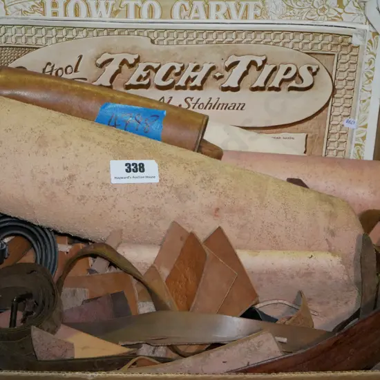 box; belts, leather pieces, how to publications