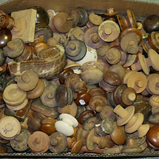 box of various wooden cupboard handles