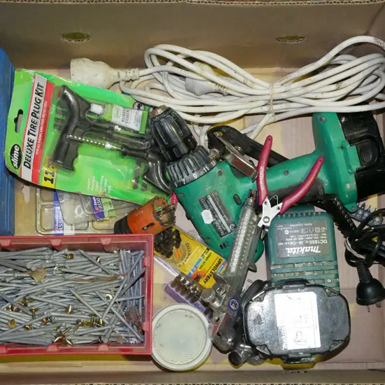box; battery drill, tyre plug kit, extension cord etc