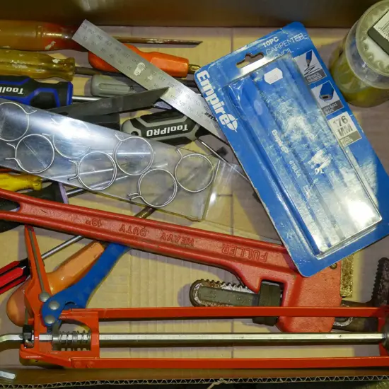 box; caullking gun, plumber stilson, builders square etc