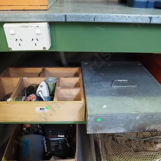 segmented wooden tray, fishing lures, reels, line, fish smoker - green dots