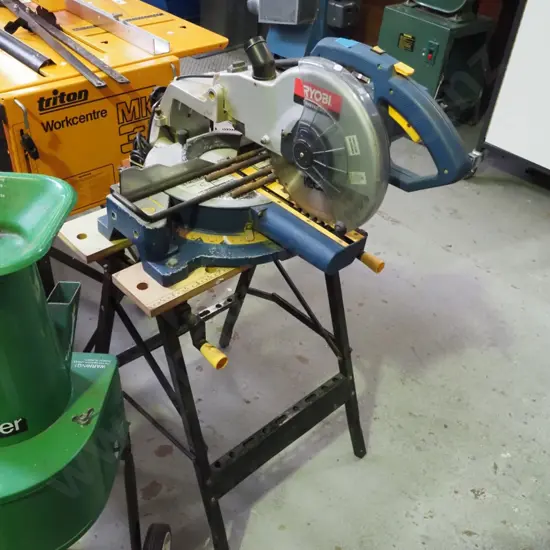 Ryobi compound mitre saw on stand