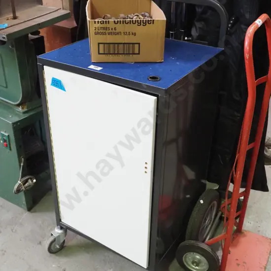 metal cabinet on casters - used to hold overhead projector
