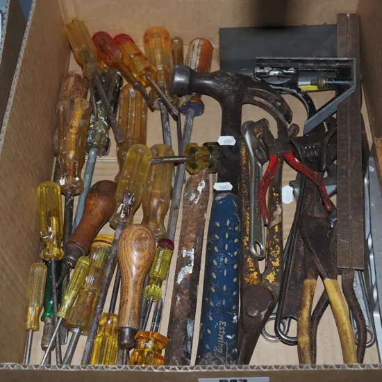 box; hammer, sharpening stone, screwdrivers etc