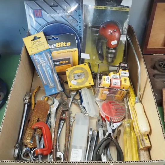 box; park plugs, drill bits, tape measure etc