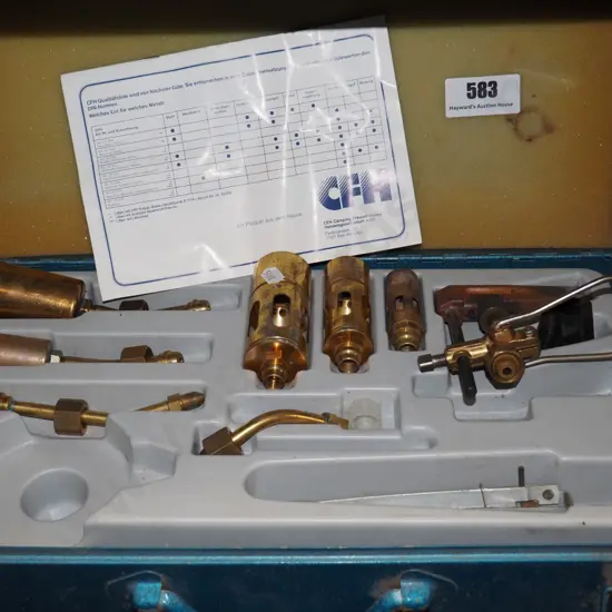 tin case of  blow torch heads