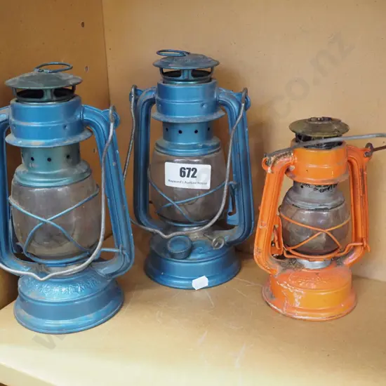 3 hurricane lanterns