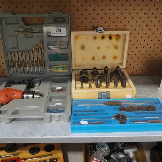 right angled drill set, router bits, small tap and die set