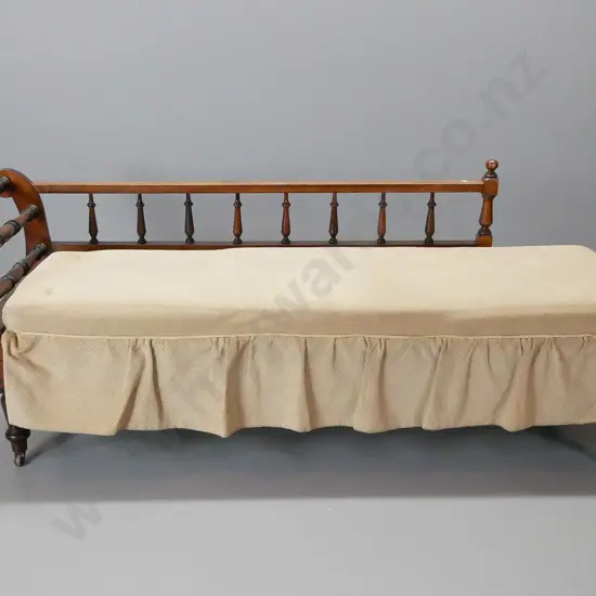 Edwardian beech rail back daybed having turned gallery on back, turned rail to one end, spring base on turned legs
