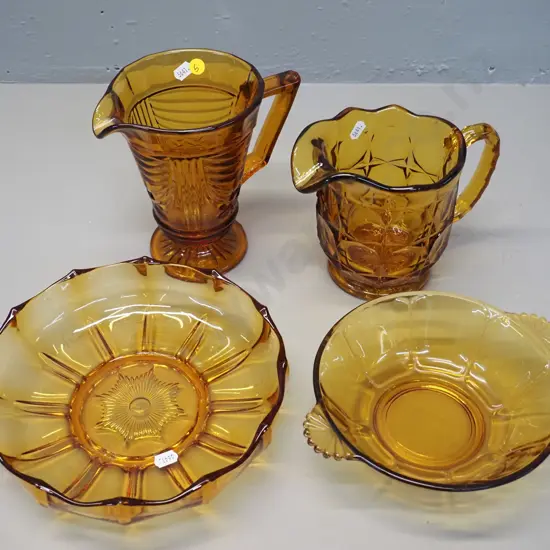 heavy amber depression glass items - 2 water jugs, taller is H-180 and 2 bowls, larger is D-235