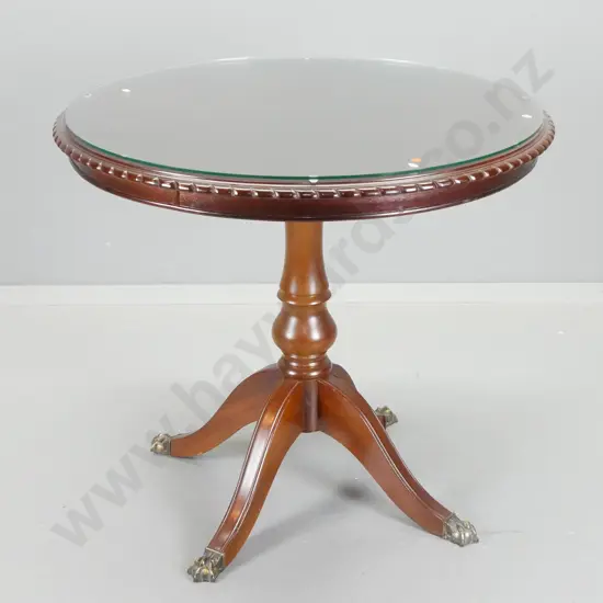 reproduction mahogany centre pedestal supper table with metal ball & claw feet, rope edged top, glass on top H-720 D-780