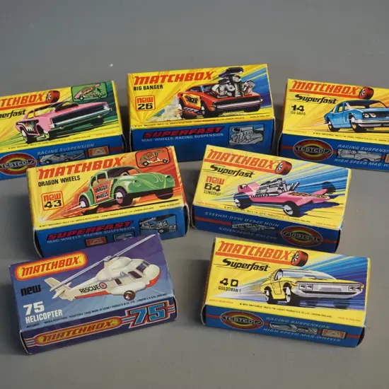 7 Matchbox vehicles in original boxes -  assorted Superfast cars and a helicopter