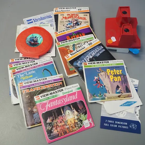 retro red and white Viewmaster with numerous reels