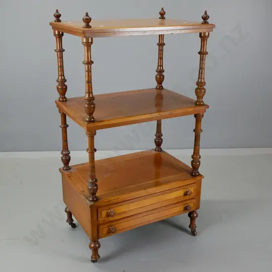 antique walnut whatnot - 2 drawers in base, 2 shelves, banded inlay decoration & turned spindles, on porcelain casters