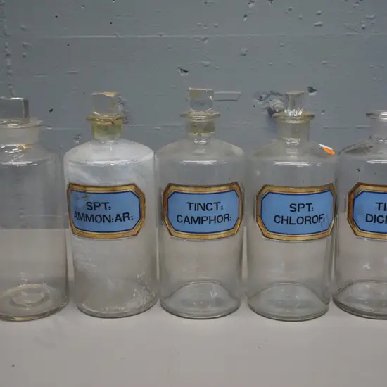 5 apothecary bottles with labels - 4 with labels, one has no stopper, some stoppers stuck - H-250 D-100