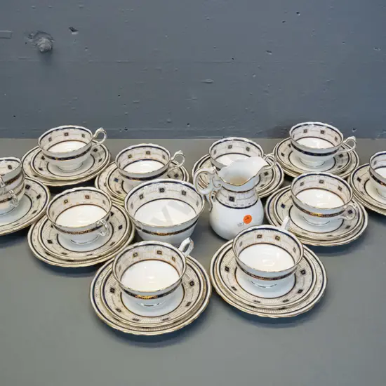 Bisto English china tea ware - 9 trios, cream jug and sugar bowl, 2 spare cups & plates