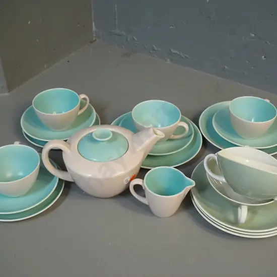 assorted Poole tea and table ware - teapot, creamer, 4 trios, 2 soup bowls & 3 saucers - 2 different sizes side plates