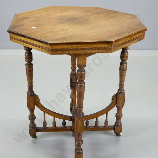 vintage oak octagonal occasional table with spindle cross-base, original porcelain casters H-640 W-590 D-590