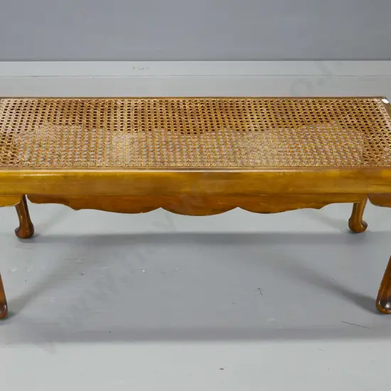 mahogany cab-leg wide stool with bergere cane top - some loss of polish. H-360 W-840 D-340